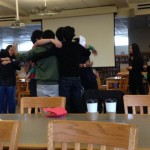 Members hug after playing "cross the line." Photo by Elia Chen.