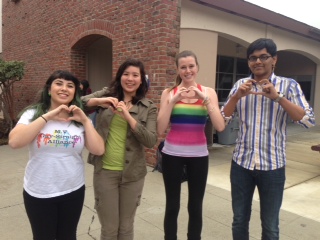 The club officers wear  their club shirts or rainbow shirts to celebrate National GSA Day. This Friday, the club plans to discuss ways to improve the club. Photo by Joyce Varma.