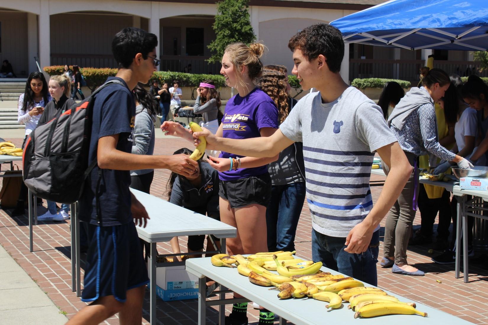 Junior Alex Maertens helped out with the event.The bananas he was collecting from participating students quickly built up as more and more people arrived.