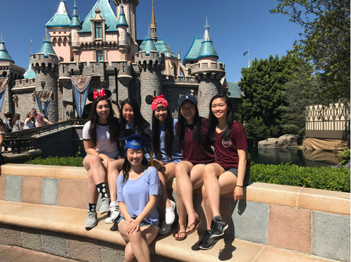 Law (center) with other dance team members at Disneyland. Since Nationals is in Anaheim, Calif., the dancers get to visit Disneyland. Photo used with permission of Sabina Law.