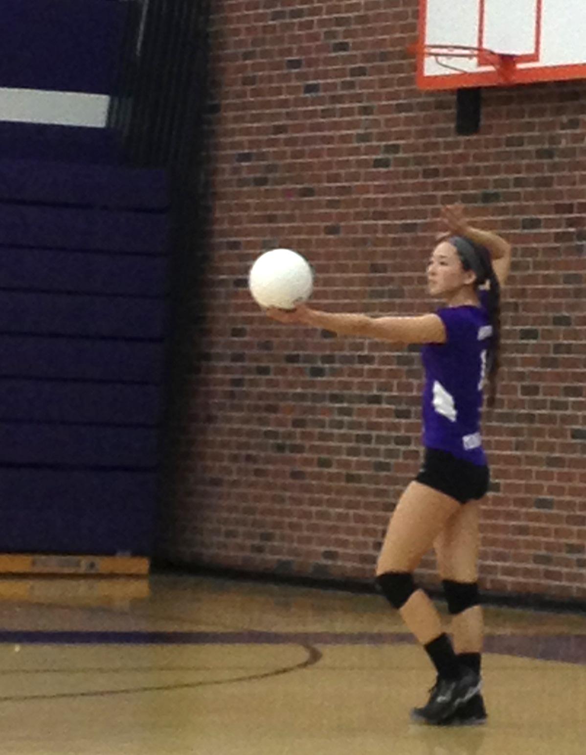 Sophomore Sydney Howard serves the ball for a point. The final score of the match was 3-1.