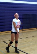 Junior Sydney Howard practices her serves in preparation for the upcoming season.