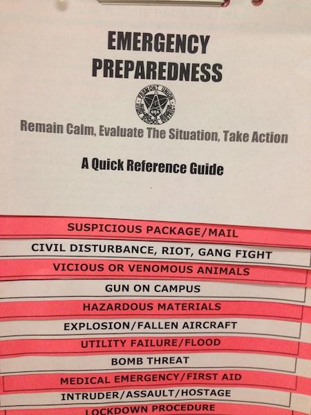 There is a packet of emergency preparation guidelines in each classroom. Although measures like these are common in schools, some students believe that more precautions should be taken to increase safety. Photo by Varsha Venkat.
