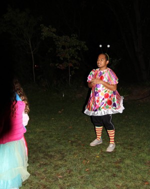 A Hidden Villa intern dressed as a Jitterbug addresses a group of children and their guide. Though a few Hidden Villa interns jokingly commented on his clothing, he was loved by all of the children. Photo by Dylan Tsai.