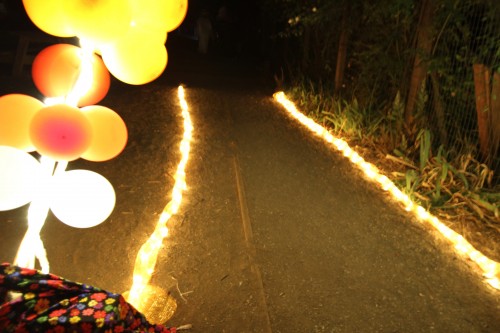 Joshi: Isn’t this magical?”                                  Child: *pointing to the end of the lights on the ground* Is that the end of the Yellow Brick Road? Photo