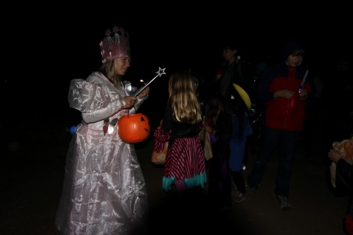 The Good Witch is the last station of the walk aside from the final party. She tells the children that if they want to go home, they must tap their heels three times. Photo by Dylan Tsai.