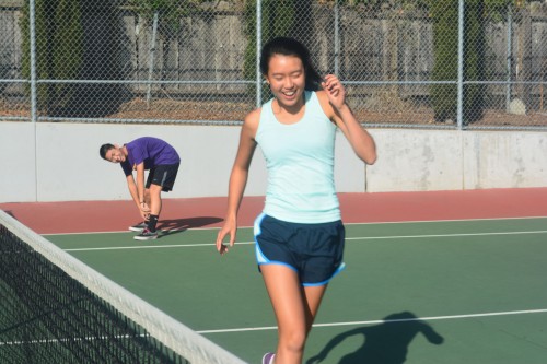 Starting a Racquet Junior Sarah Lim runs ahead of junior Austin Chan on Oct. 2. Along with junior Uma Kirloskar, the two trained at a clinic at Cuesta Park. Photograph by Malini Ramaiyer
