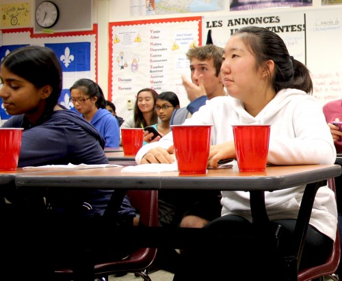 CAPTION: While enjoying beverages and food, students watched the movie Pink Panther. The movie was a way for the French students to come together and bond. Photo by Sharon Tung.