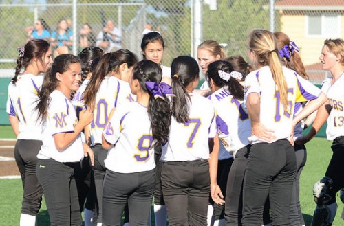 The team huddles between innings on March 25. MVHS defeated Mission San Jose High School 10-0 in five innings. Photo by Pranav Iyer