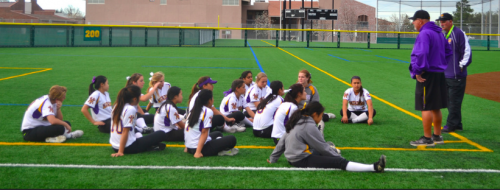 Softball players listen to coach Ray Teixeira after their game against Aragon High School on March 11. The Matadors defeated the Dons 11-6 in their second of four back-to-back games. Photo by Malini Ramaiyer