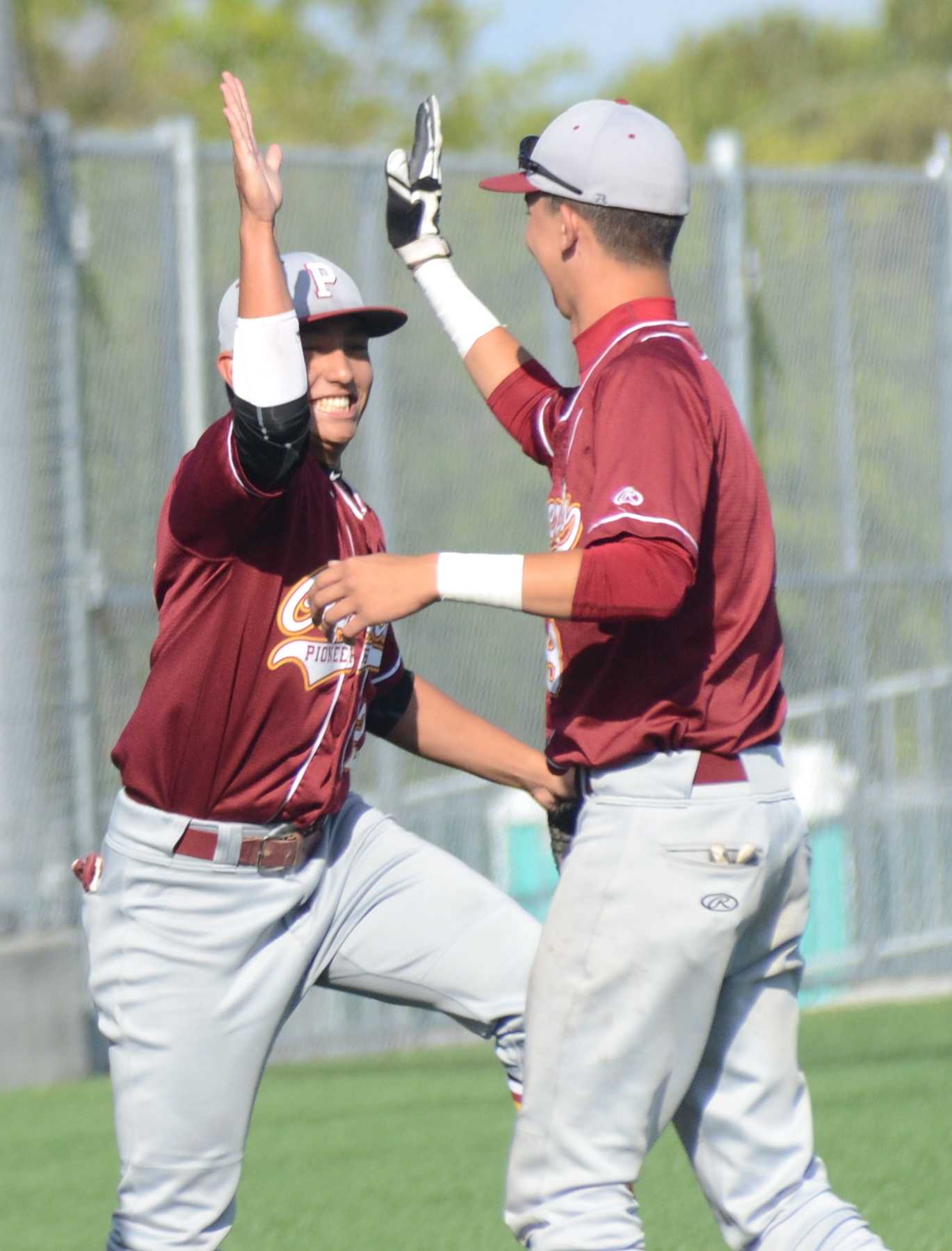 After securing the win, two Pioneer teammates celebrate with each other. It was a big win for them in terms of the rivalry and CCS and league implications. Photo by Pranav Iyer. 