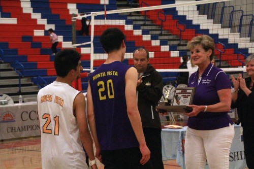 Principal April Scott presents presents the second place trophy to team captains seniors Tejas Gopal, David Chang and James Mullen. After losing the CCS finals match, the Matadors took second place behind SFHS. Photo by Pranav Iyer. 