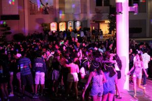 Students gather in the rally court on a Friday night. The Welcome Back Dance offered games, a DJ, food and other forms of entertainment.  Photo used with permission of Maya Schwarz and Anella Palacpac
