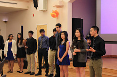 Octagon officers, including junior Mahesh Murag, introduce Cure Cancer Cafe in March 2014. Cure Cancer Cafe is an annual fundraiser hosted by the service club to raise money for cancer research. Photo taken by Justin Kim.
