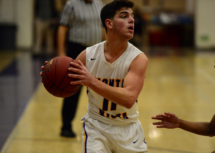 Golan Gingold looks for an open teammate during the Monta Vista Holiday Tournament. The Matador offense exploded in the first, which led them to an early lead.