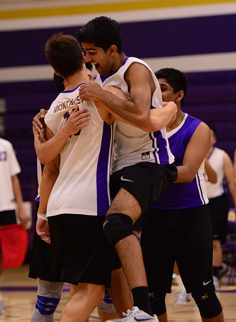 Senior Nathan Mallipeddi embraces senior Ethan Kulla at the end of the match. Kulla scored the match point off of an ace. Photo by Pranav Iyer