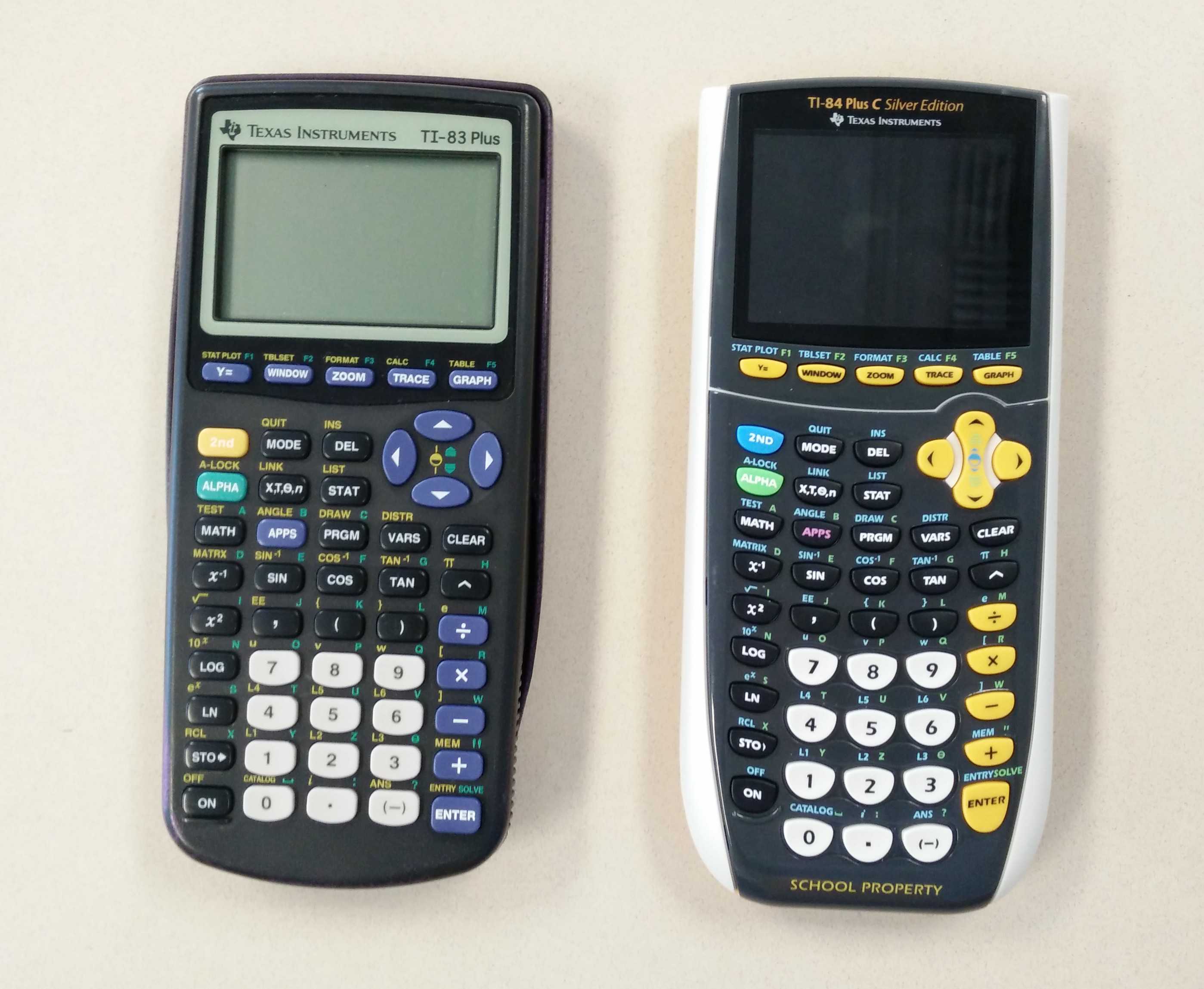 A comparison between the original TI-83 Plus and the new TI-84 Plus. The revamped calculators have colored displays and rechargeable batteries.