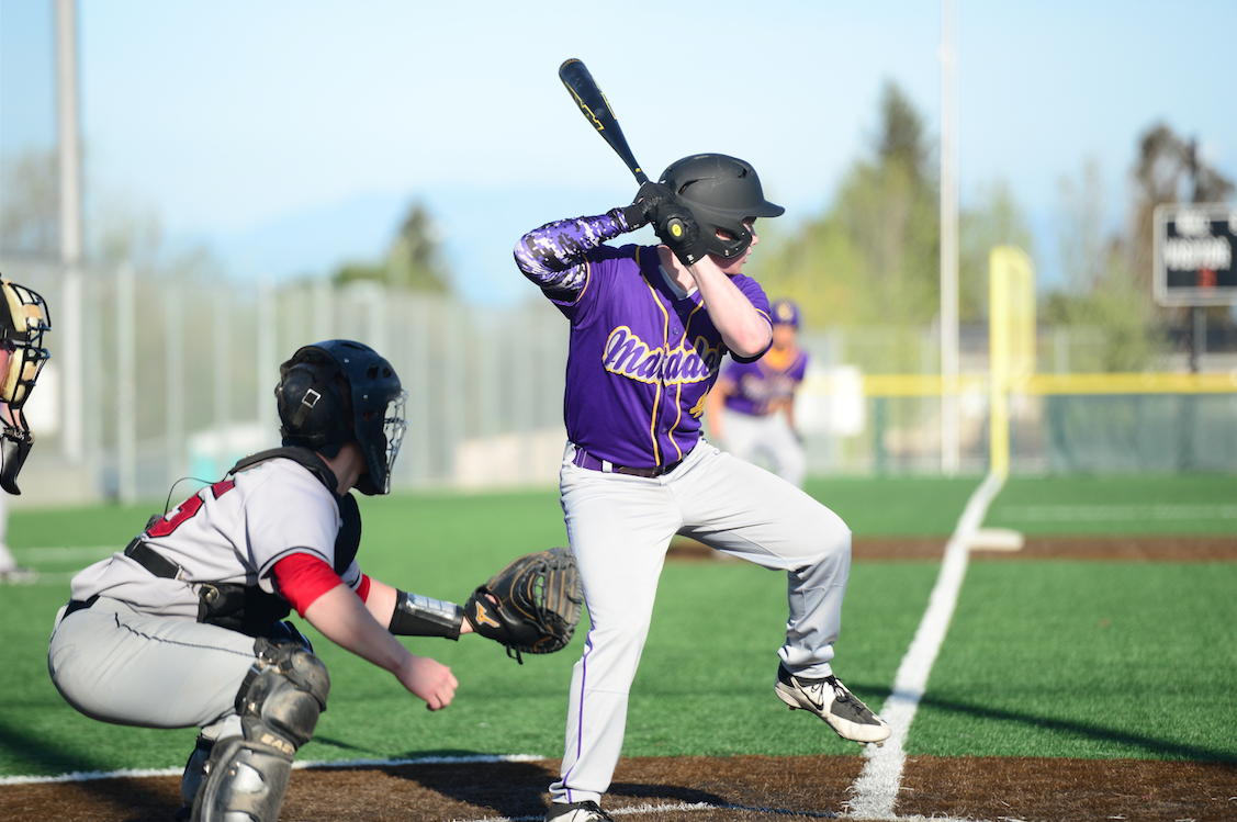 Senior Matt Burke raises his leg and gets ready to swing at a pitch. The Matadors' bats started eating up in the third and fourth innings, where they combined to score four runs. Photo by Pranav Iyer. 