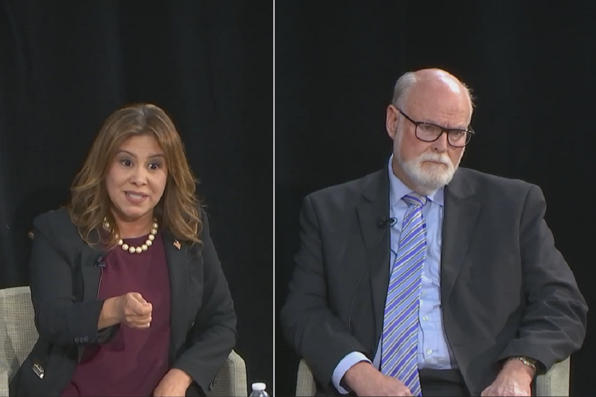 Assemblywoman Nora Campos (left) attacks State Senator Jim Beall (right) after being questioned about her oil company supporters.
