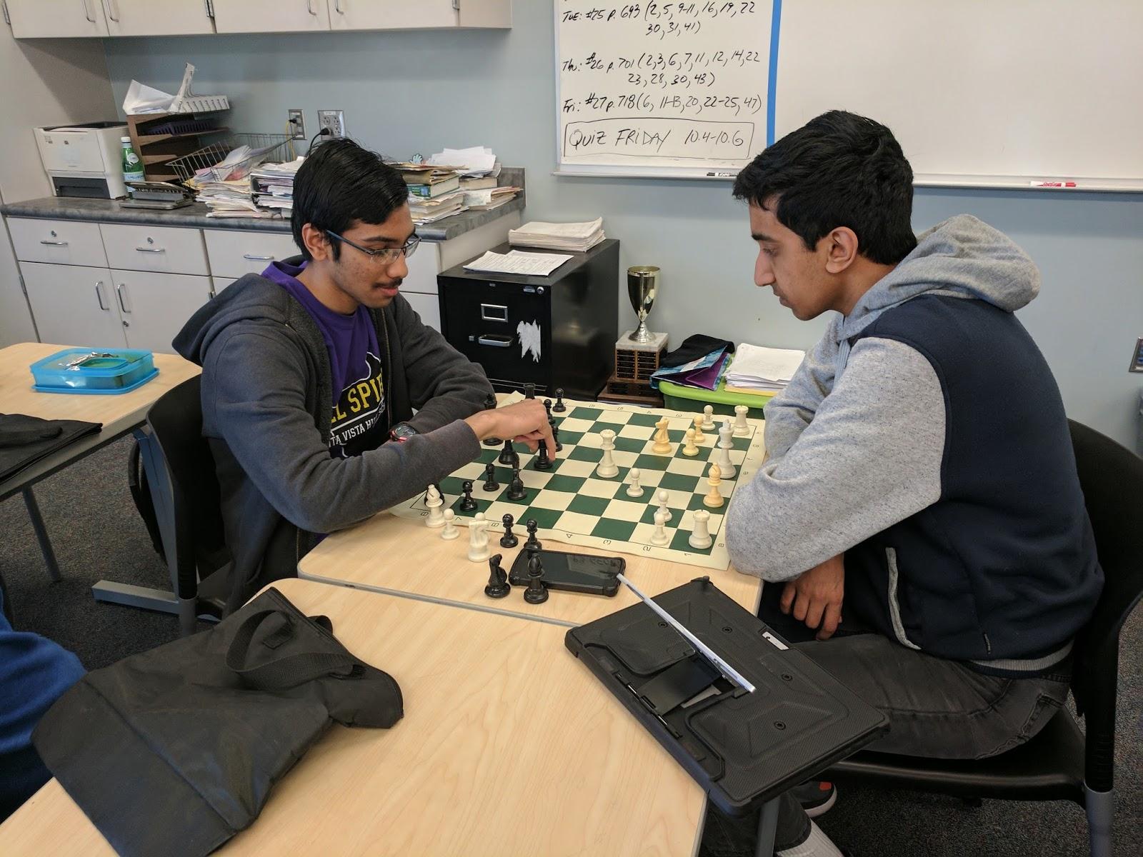 Sophomore Samyak Karnavat (left) and Senior Kesav Viswanadha (right) play a friendly game of chess at lunch while discussing strategy. Practice was a vital part of keeping one’s mind sharp and flexible for future games.