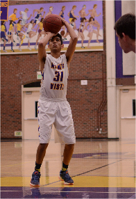  Senior Aditya Mohan attempts a three-point shot in a highly-anticipated rivalry game. The Matadors lost to Lynbrook HS 52-54, ending the season with a 0-12 league record.