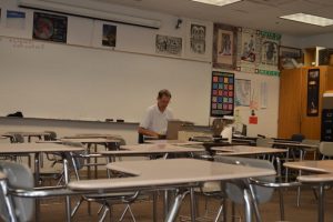Jennings is working in his now-empty seventh period class. Photo by Rajas Habbu.