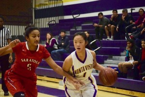 Joyce Chen drives to the basket against an SHS defender. MVHS scored many of their points through layups on fastbreaks. Photo by Shayon Moradi.
